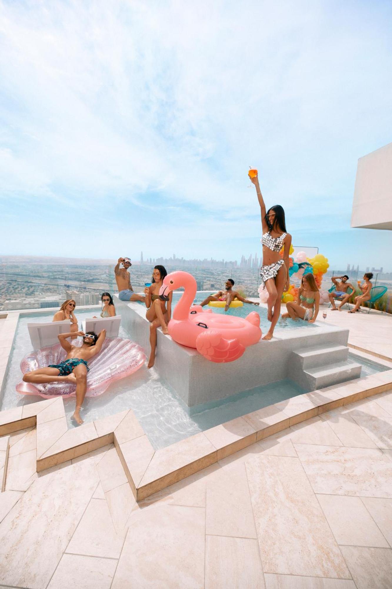 Five Jumeirah Village Dubai Exterior foto The rooftop pool at the SLS Las Vegas